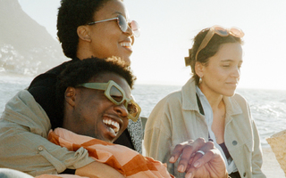 Friends hanging out at the beach