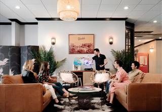 Group of people in Glendale Express lobby