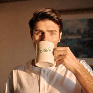 Man with Glendale Express mug